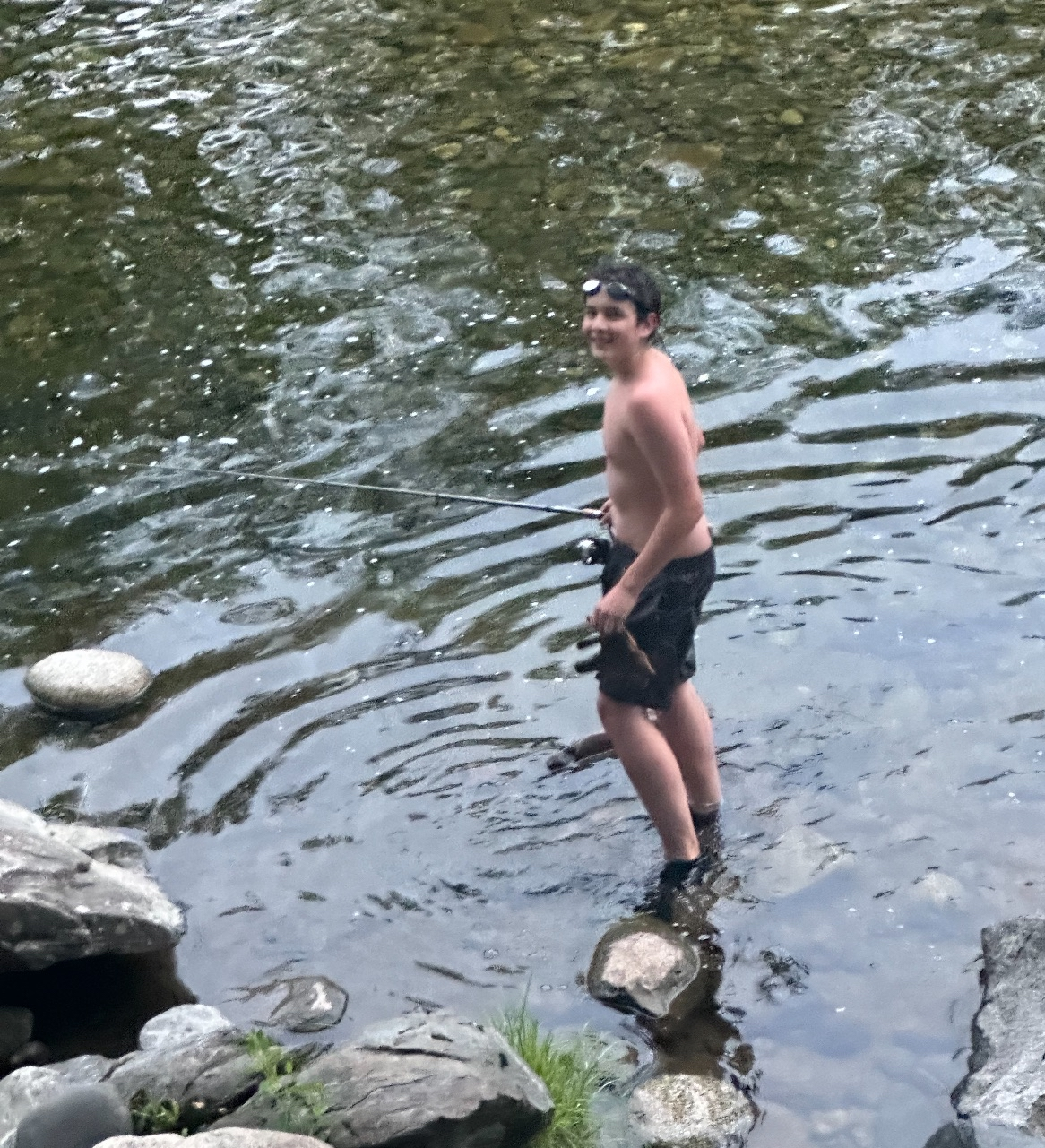 Noah fishing in the Wild Ammonoosuc River at Swiftwater